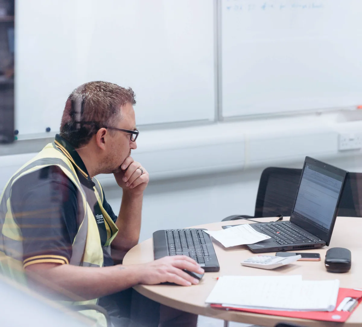 A Rada engineer planning product improvements at a desk